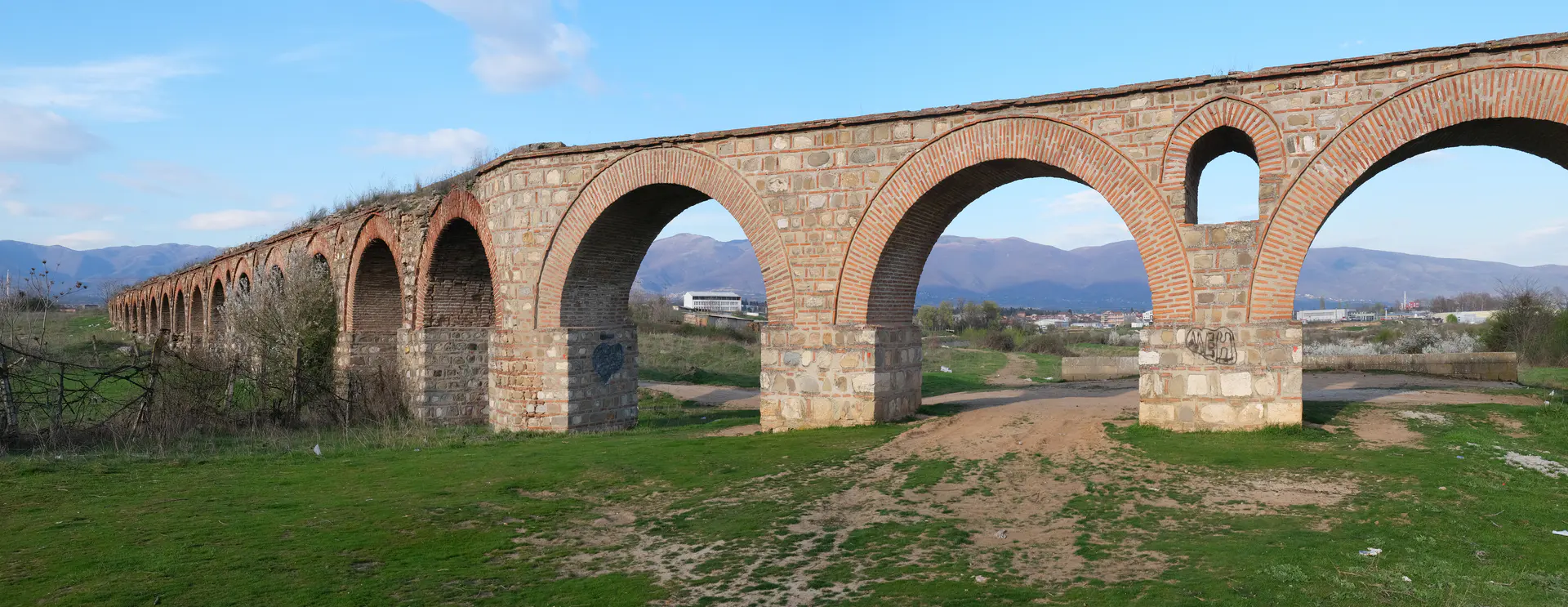 Stone and brick arches of the historic Skopje Aqueduct